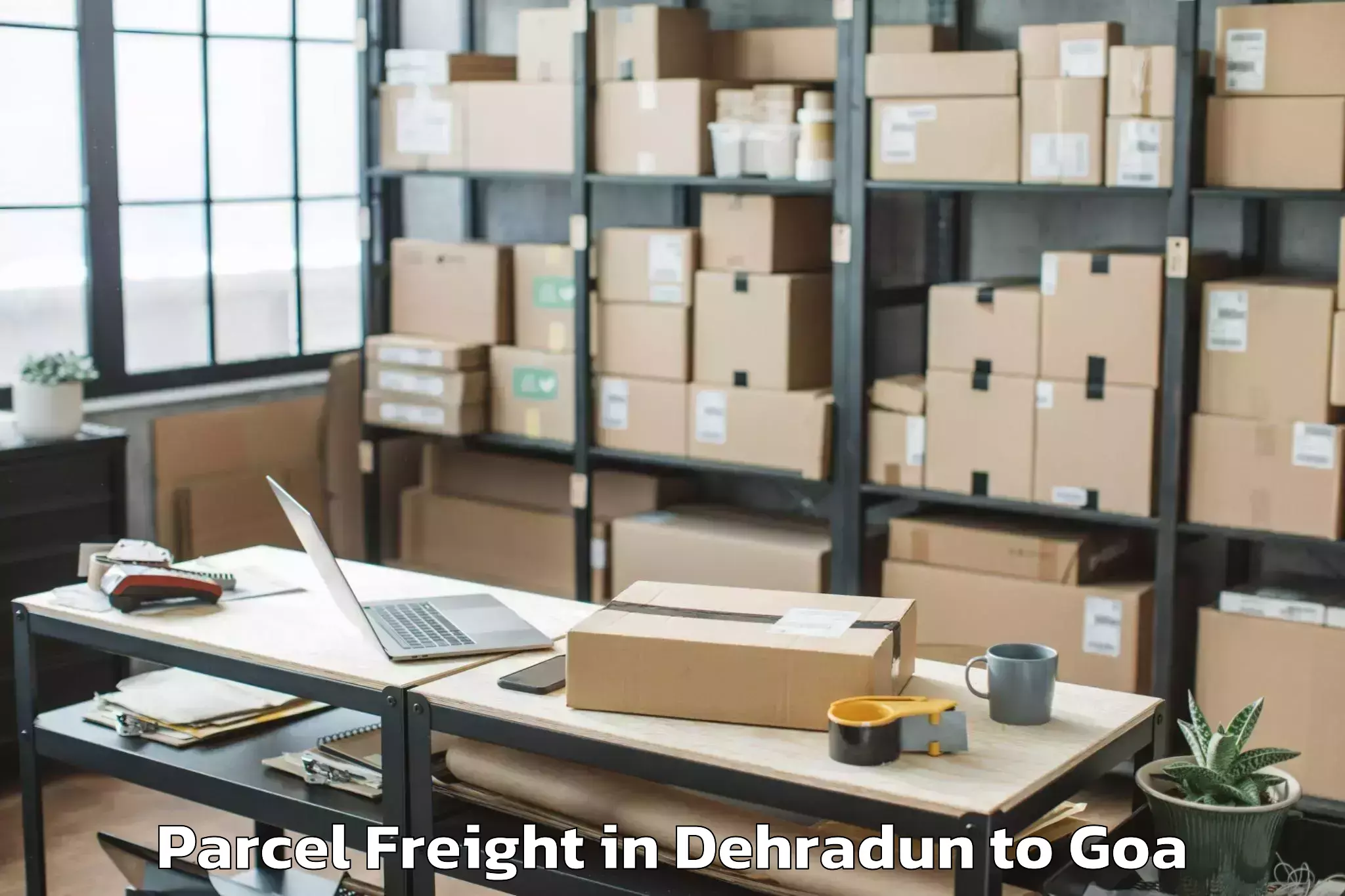 Book Dehradun to Valpoi Parcel Freight Online